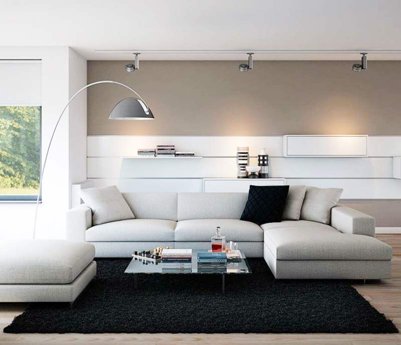 Canapé d'angle gris tissu dans salon moderne