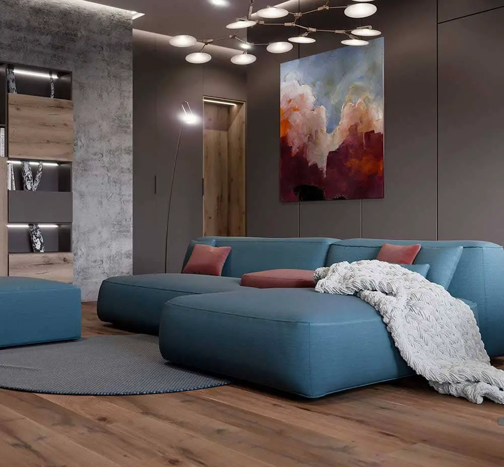 Petit salon avec un canapé cuir bleu pétrole en angle design